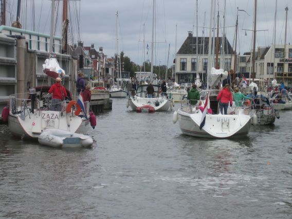 Entering Harlingen with many yachts after the flood gates opened again Entering Harlingen with many yachts after the flood gates opened again