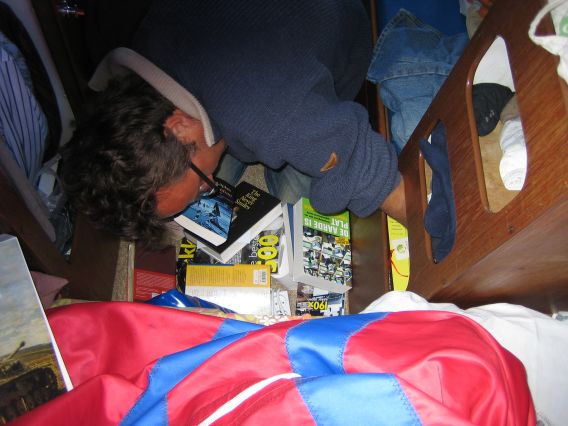 Marnix searching for a book in our ship library Marnix searching for a book in our ship library